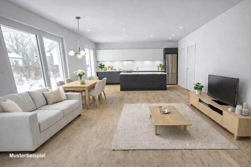 Wohnzimmer mit offener Küche Einrichtungsbeispiel - 6 Zimmer Einfamilienhaus in Bokholt-Hanredder