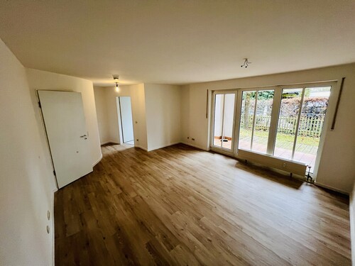Wohnzimmer - 2 Zimmer Maisonettenwohnung zum Kaufen in München