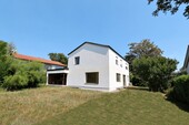 Haus_Gartenseite_West - Einfamilienhaus mit 150,00 m&sup2; in Gröbenzell zum Kaufen