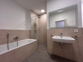 Badezimmer - Dachgeschoßwohnung mit 60,00 m² in Karlsfeld zum Kaufen