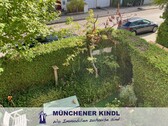 Blick in den Garten - Doppelhaushälfte mit 122,00 m² in München zum Kaufen