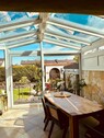 Toller Wintergarten mit Sicht zum Garten - 