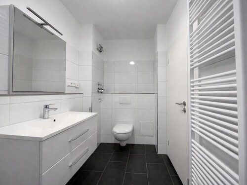 Badezimmer - Etagenwohnung mit 65,00 m&sup2; in Düsseldorf zum Kaufen