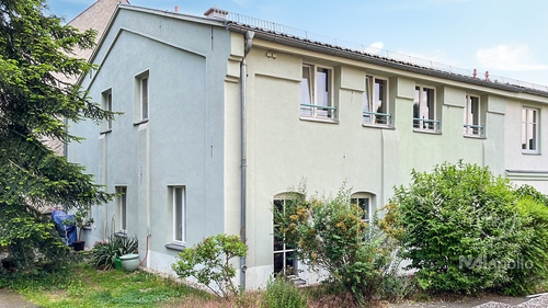 Hausansicht - ETW-PAKET: REIHENHAUS MIT ZWEI VERMIETETEN EINHEITEN