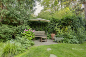 Garten (1) - PRÄMIERTES ARCHITEKTENHAUS MIT EXKLUSIVER AUSSTATTUNG AUF HERRLICHEM SÜDWEST-GRUNDSTÜCK