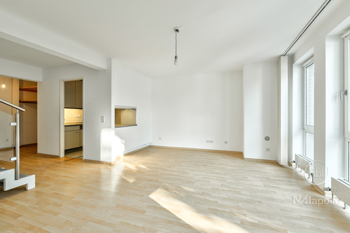 Wohnen2 - FRISCH RENOVIERTE NEUBAU-MAISONETTE MIT SÜD-BALKON UND TIEFGARAGEN-STELLPLATZ!