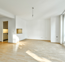 FRISCH RENOVIERTE NEUBAU-MAISONETTE MIT SÜD-BALKON UND TIEFGARAGEN-STELLPLATZ! - Teltow