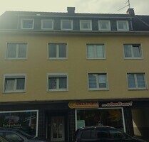 Mehrfamilienhaus mit 2 Ladenlokalen und Garagenhof in Remscheid-Süd